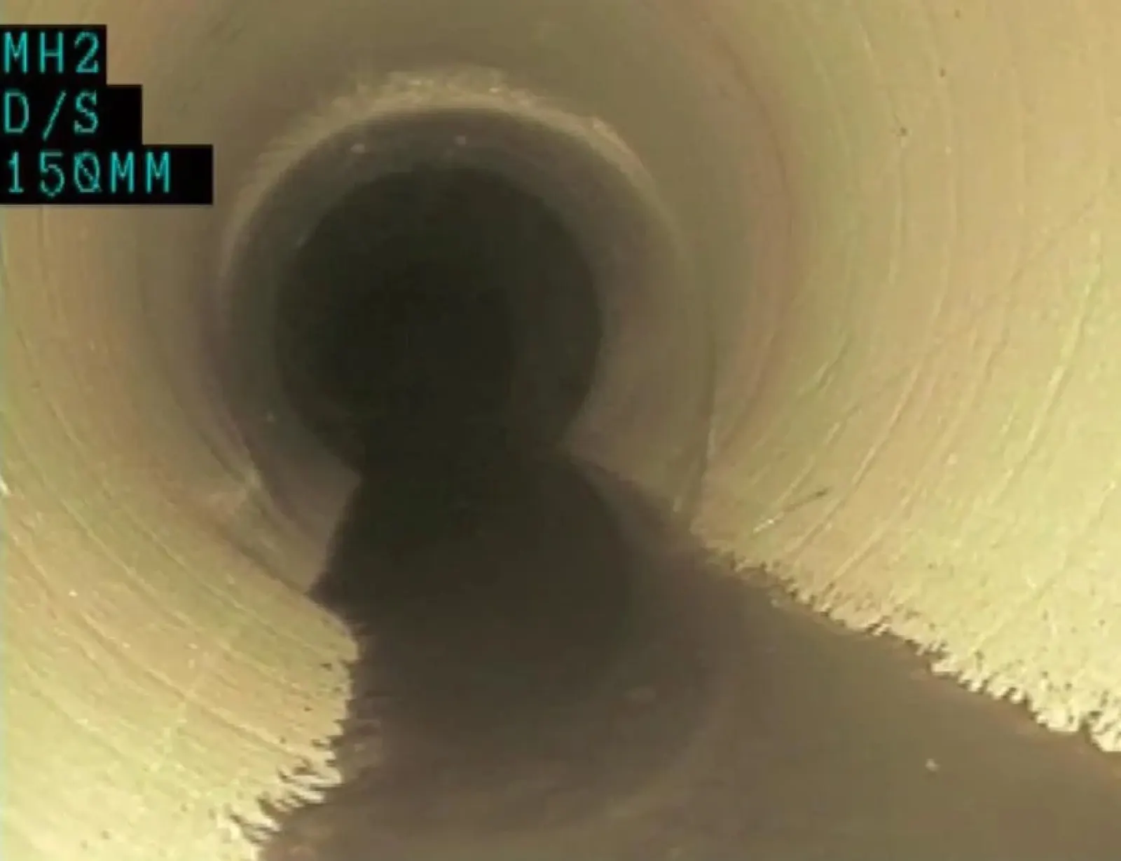 CCTV camera image of the inside of a drain