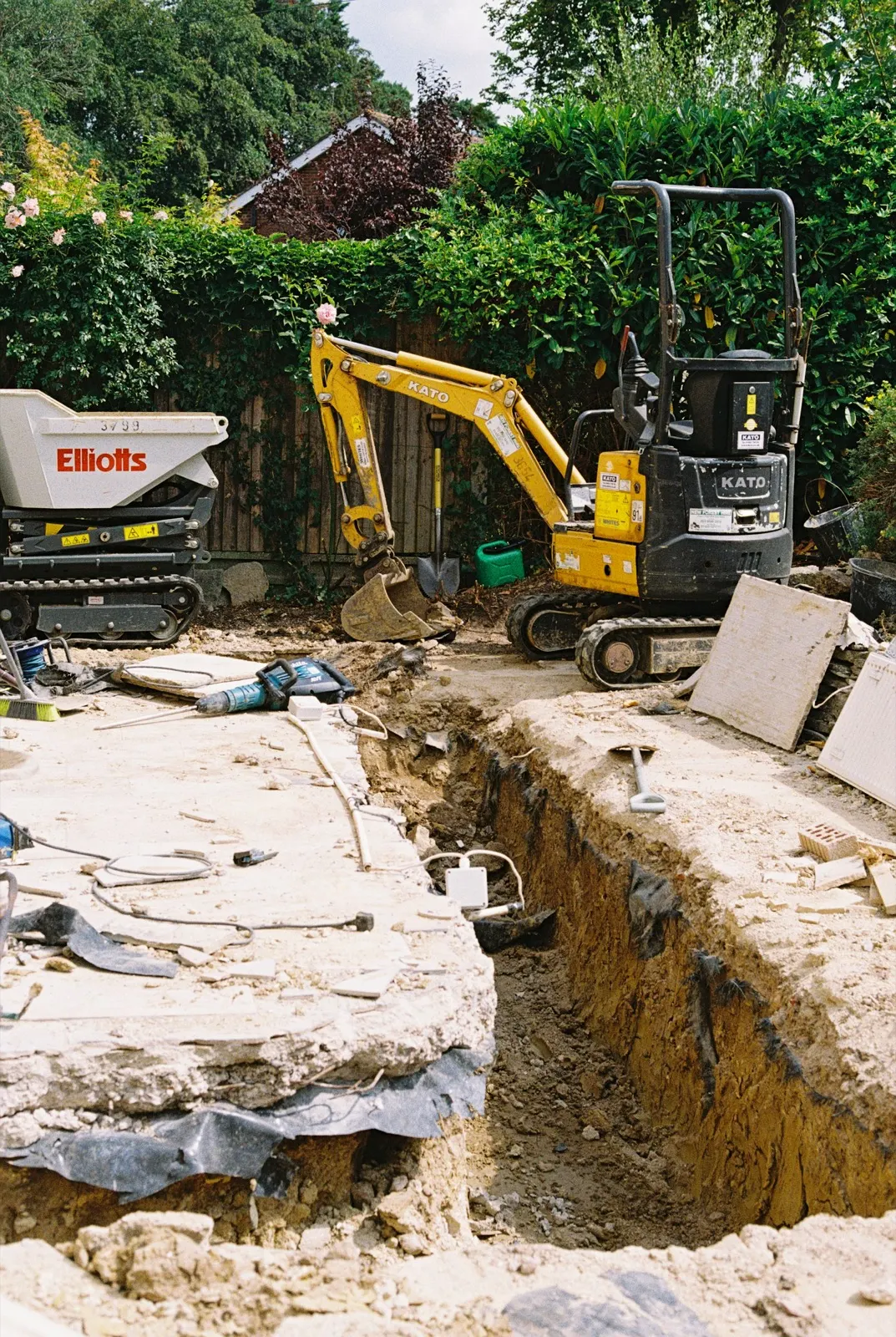 Excavated garden trench for drain pipe repairs