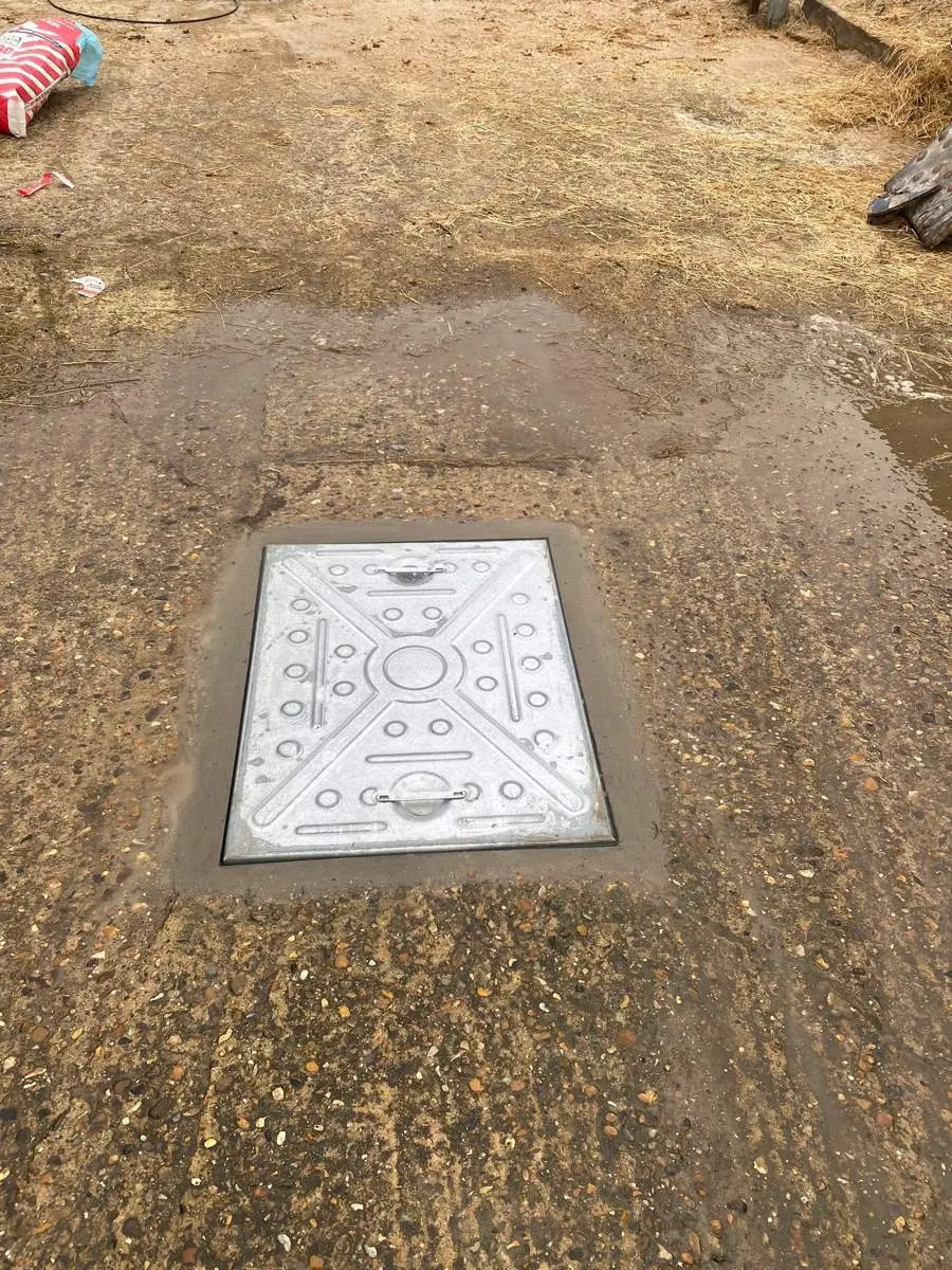 Manhole raised and cover replaced