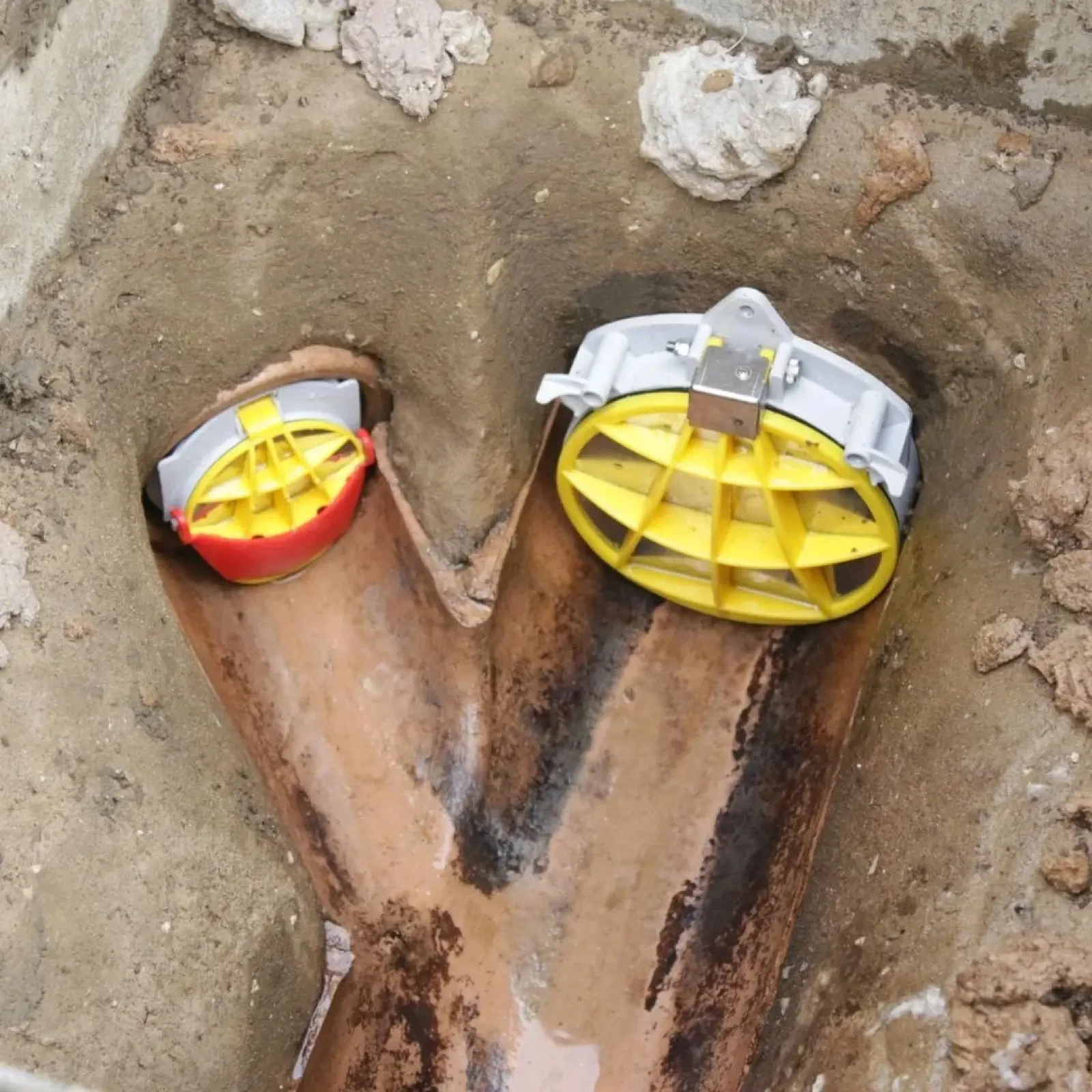 New Y-junction drainage pipe laid in a trench